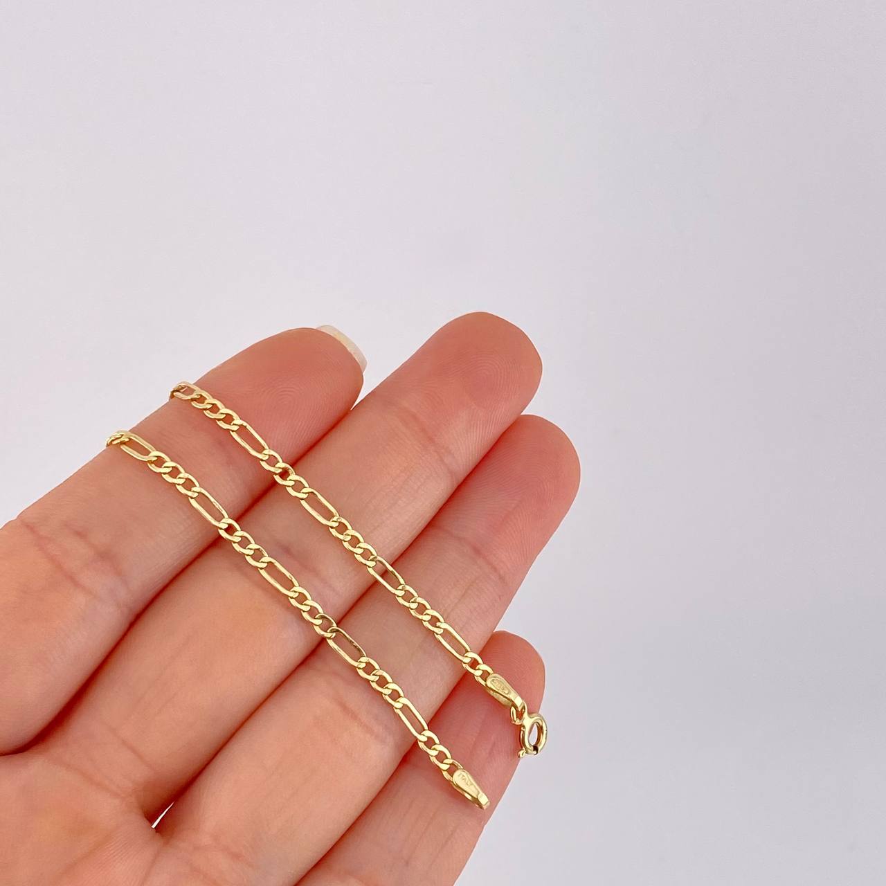 Cadena Figaro 2.7g / 60cm / 2.4mm Oro Amarillo 18K