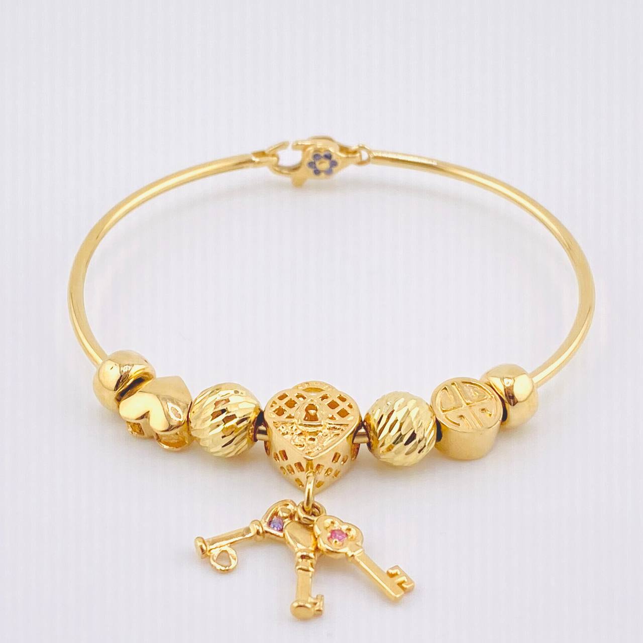 Pulso PD Llave Corazón Bolas Diamantadas 13.55gr / 17.5cm / Oro Amarillo 18K ©