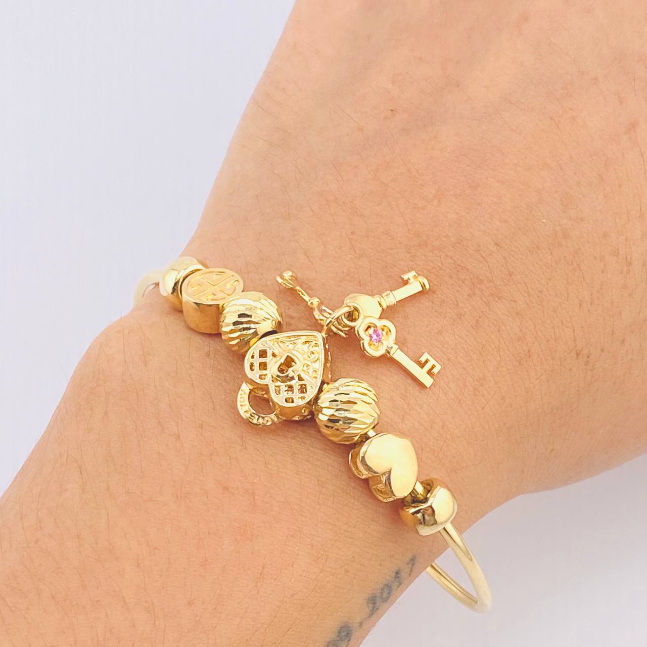 Pulso PD Llave Corazón Bolas Diamantadas 13.55gr / 17.5cm / Oro Amarillo 18K ©