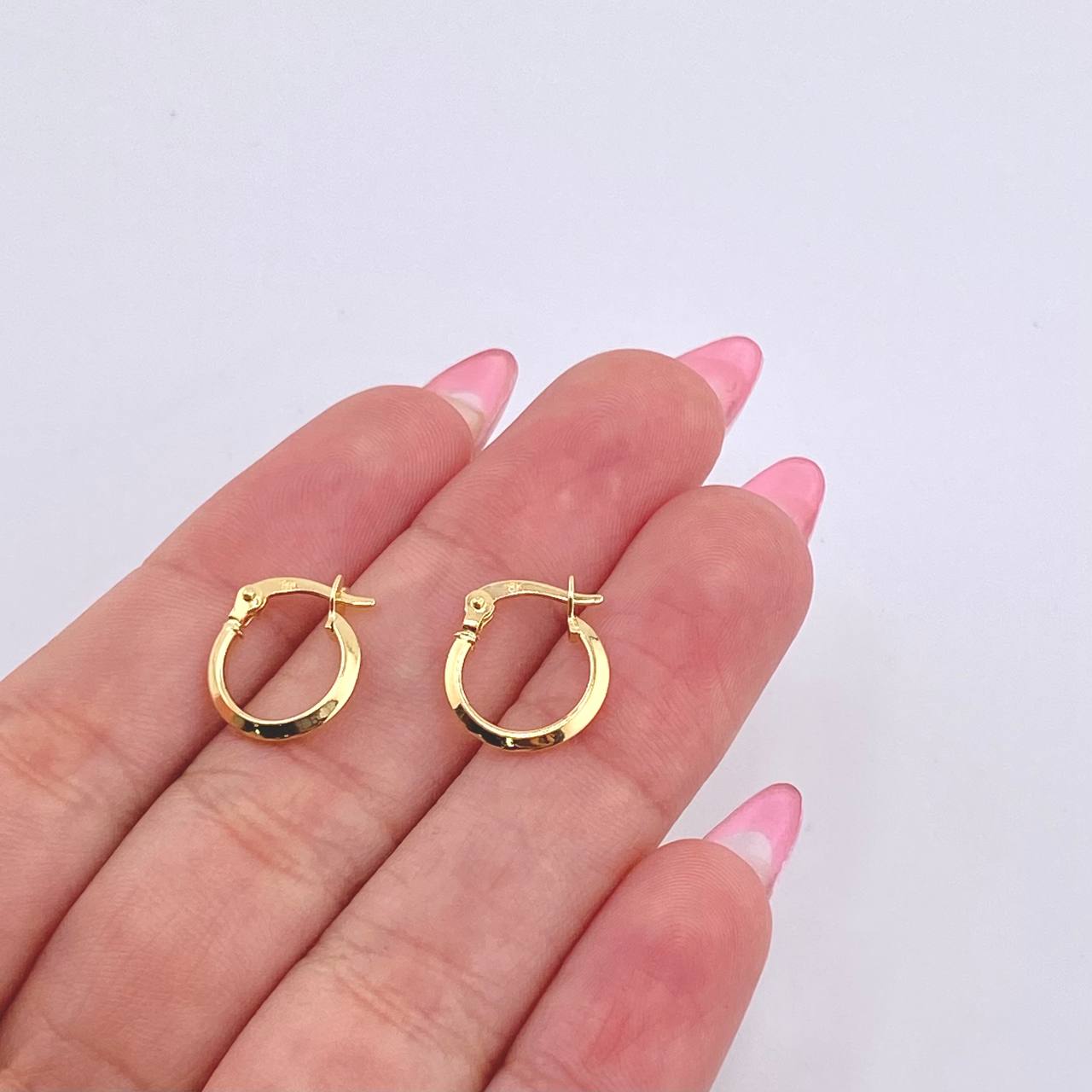 Candongas Clau 0.7gr / 1.2cm / Oro Amarillo 18K *
