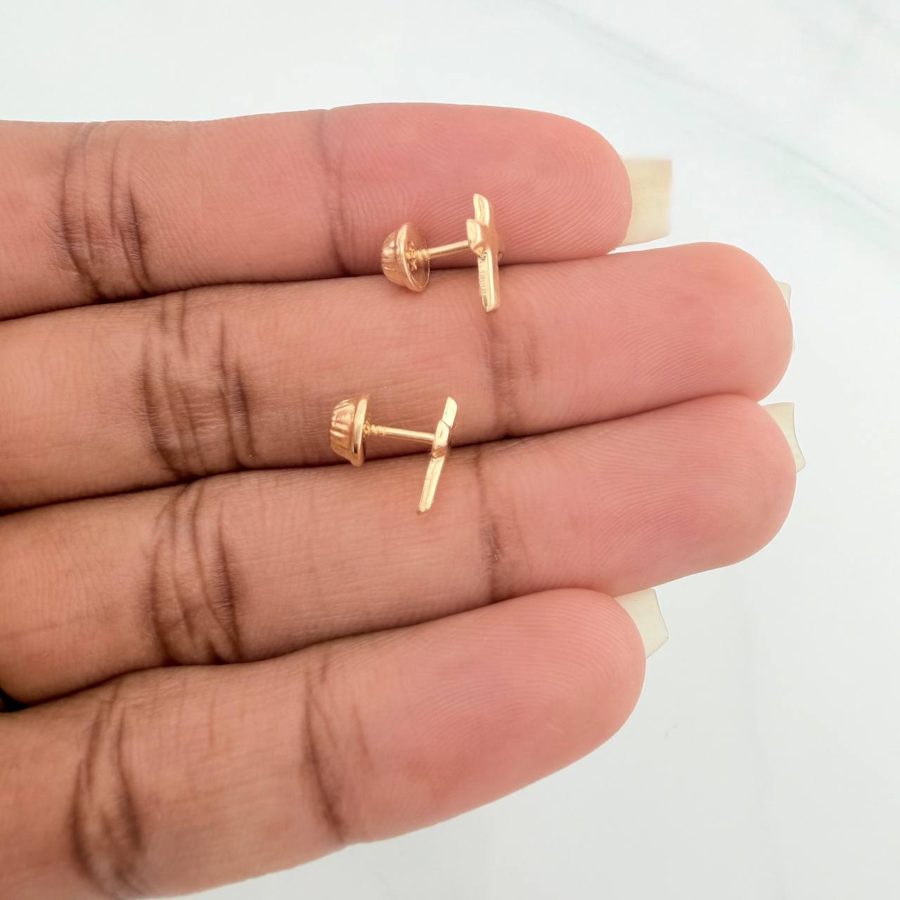 Topos Cruz 0.6gr / 9.14mm Oro Amarillo 18K %