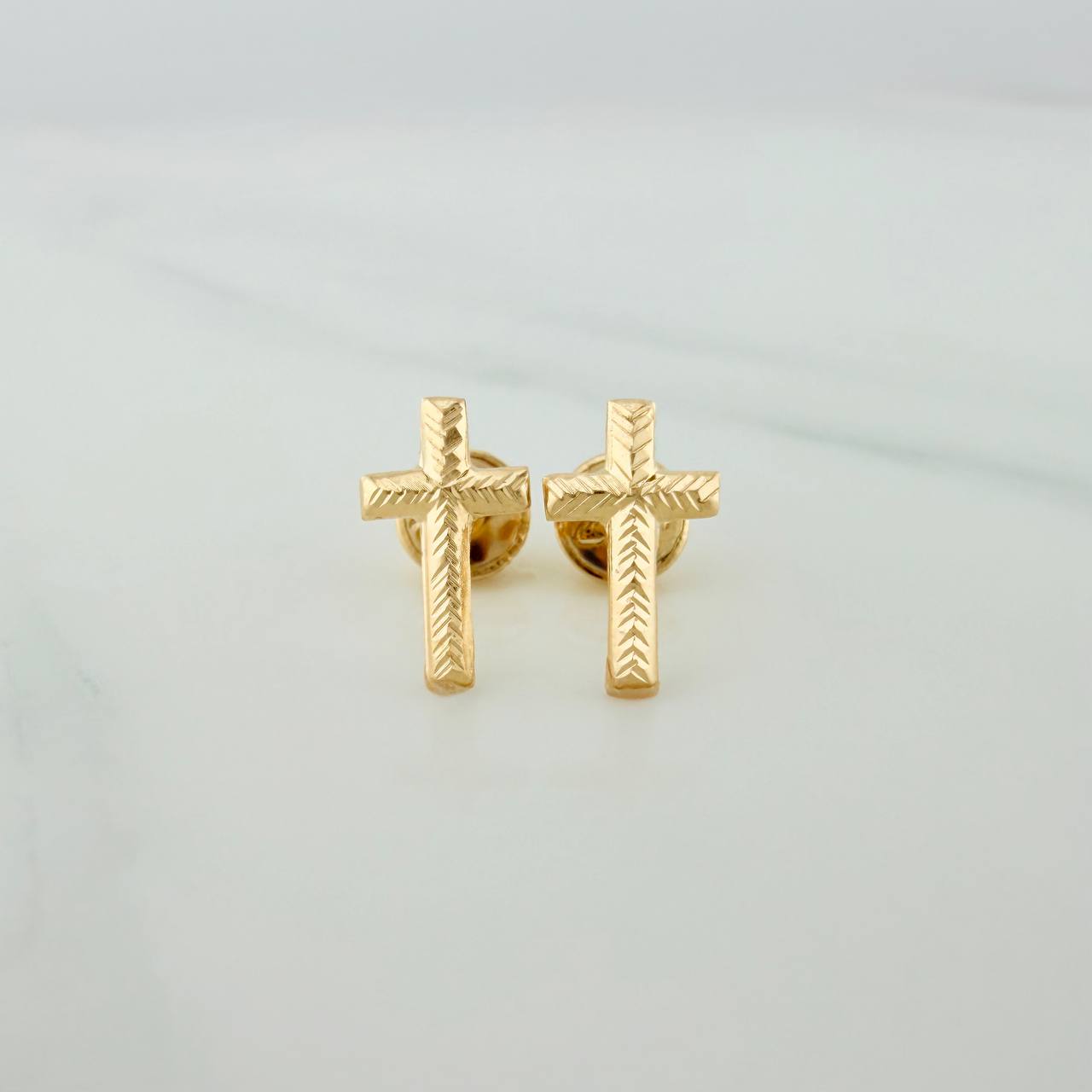 Topos Cruz 0.6gr / 10.34mm Oro Amarillo 18K %