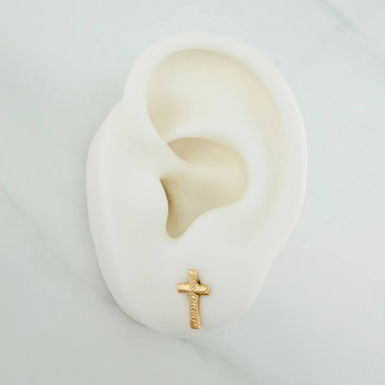 Topos Cruz 0.6gr / 10.34mm Oro Amarillo 18K %