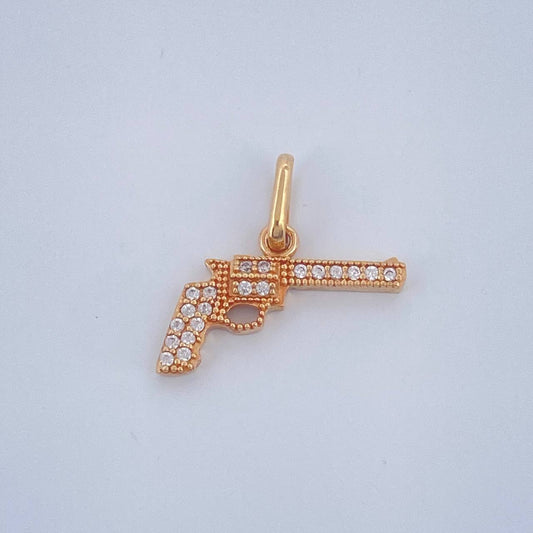 Dije Revolver 1.05gr / 1.8cm / Oro Amarillo  18K $