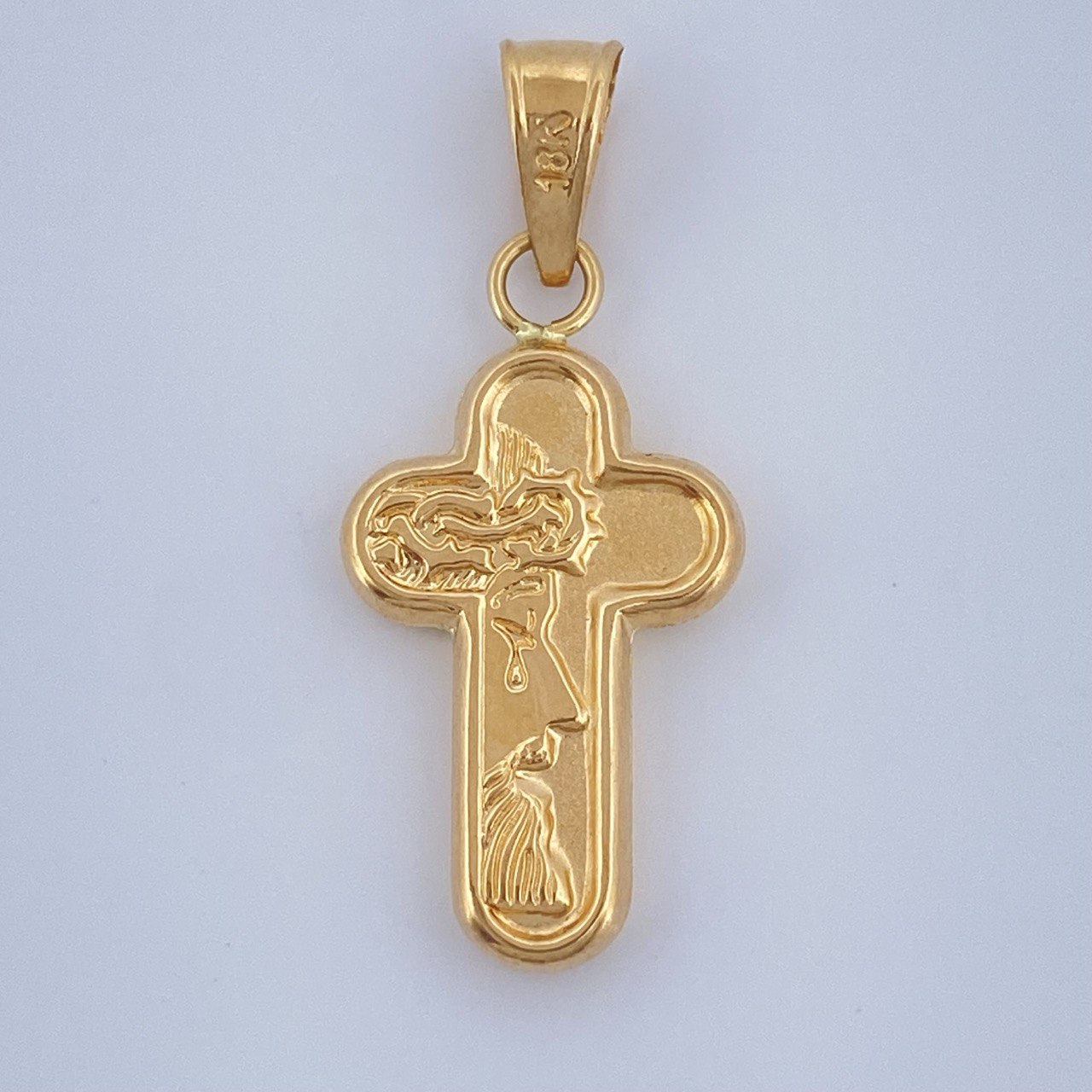 Dije Cruz Rostro Cristo 0.85gr / 2.7cm / Oro Amarillo 18K $