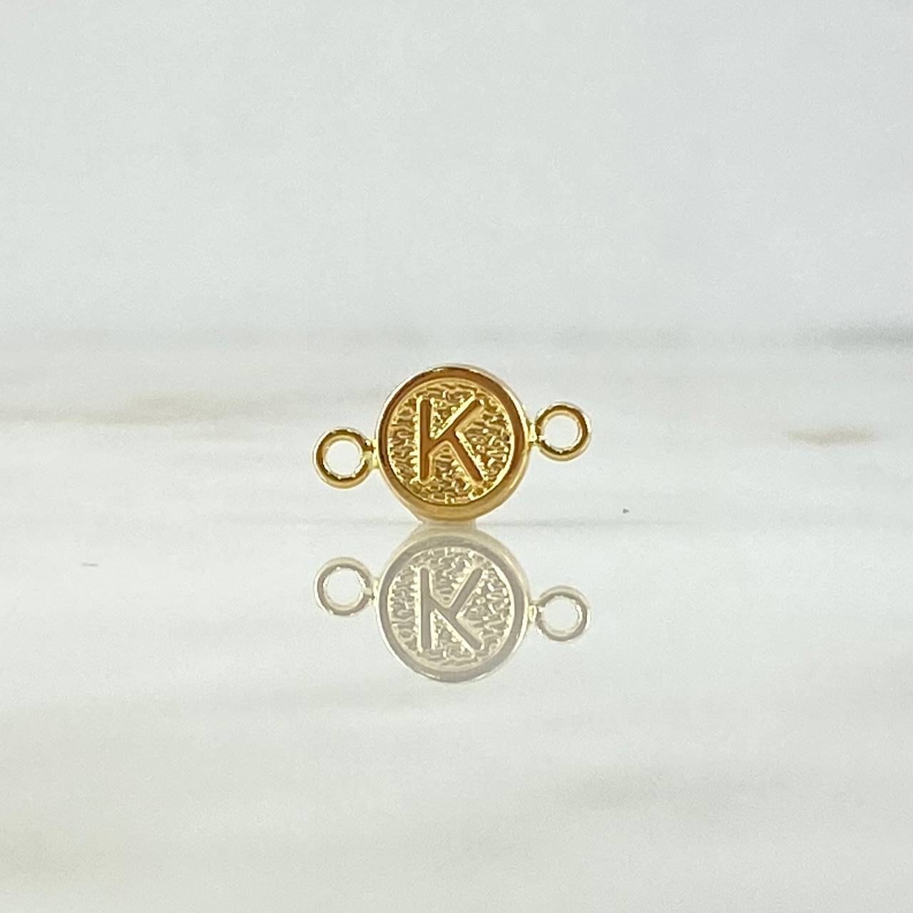 Herraje Letra K 0.35gr / 1.4cm / Circular Oro Amarillo ©