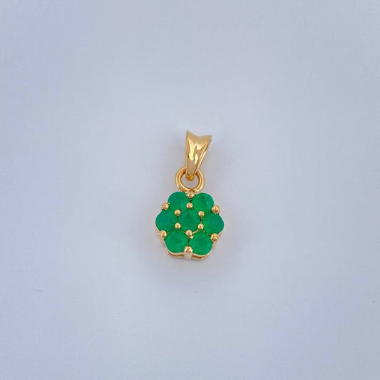 Dije Flor Esmeraldas 0.95gr / 1.4cm / Oro Amarillo 18K %
