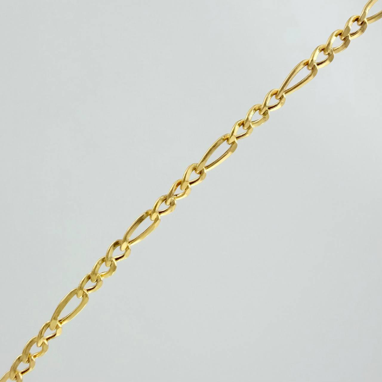 Cadena Figaro 3gr / 60.1cm / 2.4mm Oro Amarillo +1 18K $