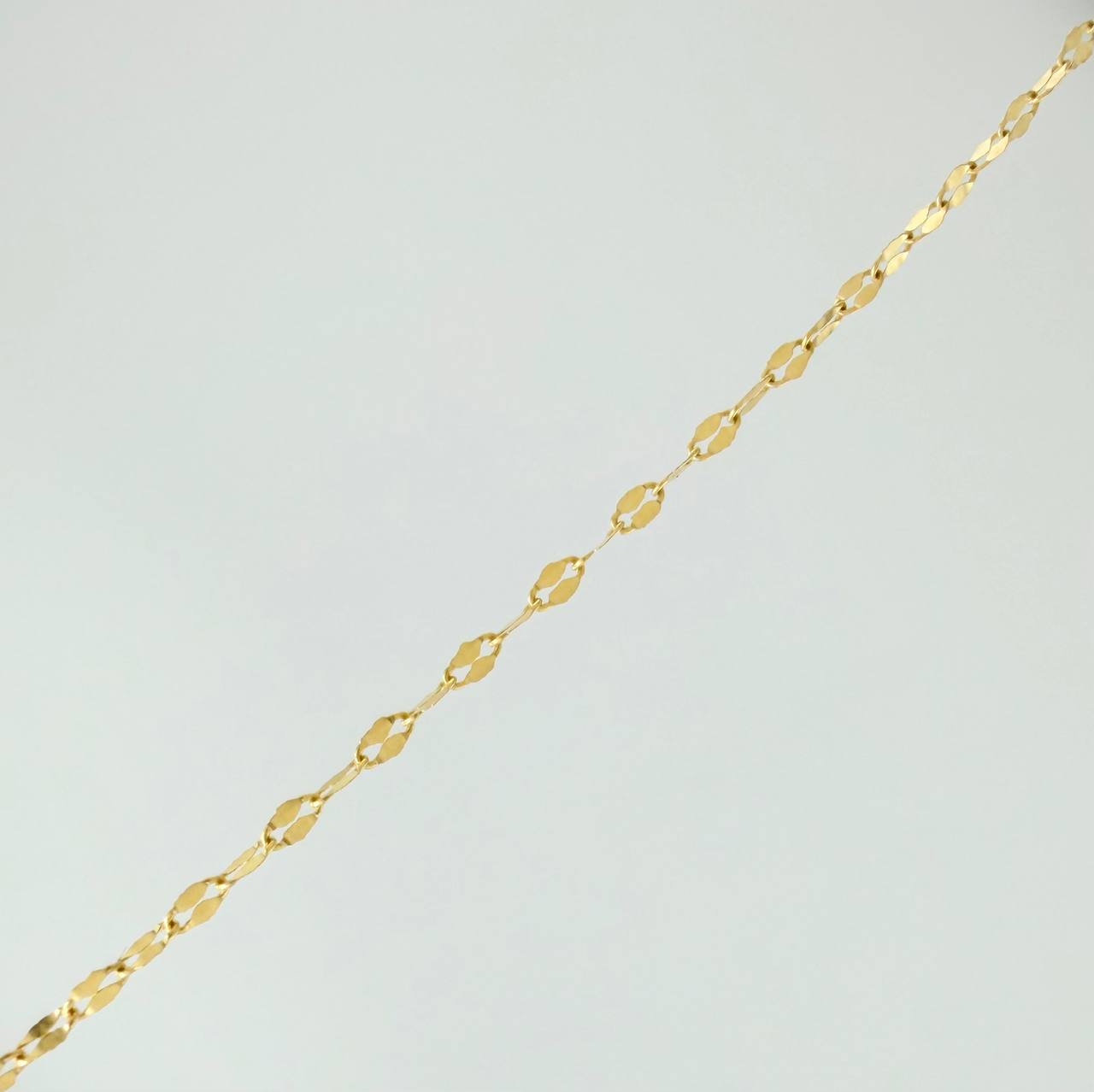 Cadena Flor Espejo 1.15gr / 60.2cm / 1.38mm Oro Amarillo +3 18K $