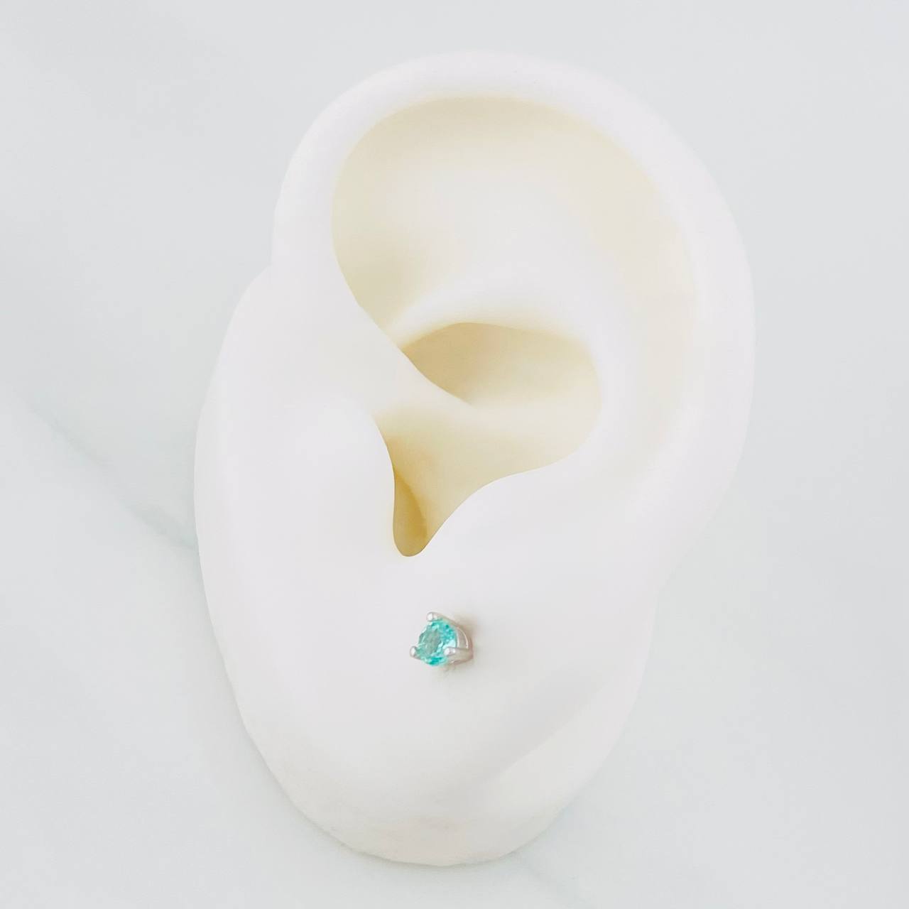 Topos Tres Garras Esmeralda 0.25pts 0.65g / 3.48mm Plata 925