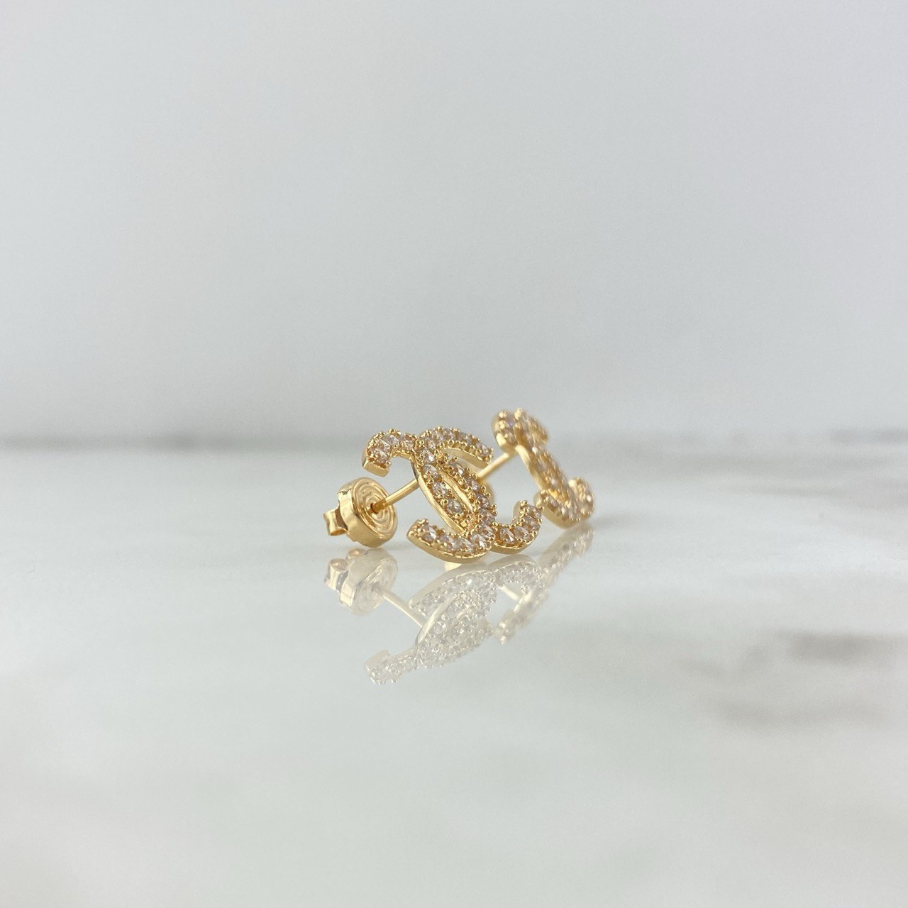 Topos Ola Cruzada 0.9gr / Circones Blancos Oro Amarillo 18K &