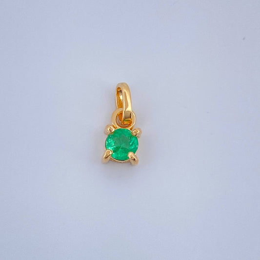 Dije Redondo Esmeralda 0.25gr / 1cm / Oro Amarillo 18K %