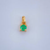 Dije Redondo Esmeralda 0.25gr / 1cm / Oro Amarillo 18K %