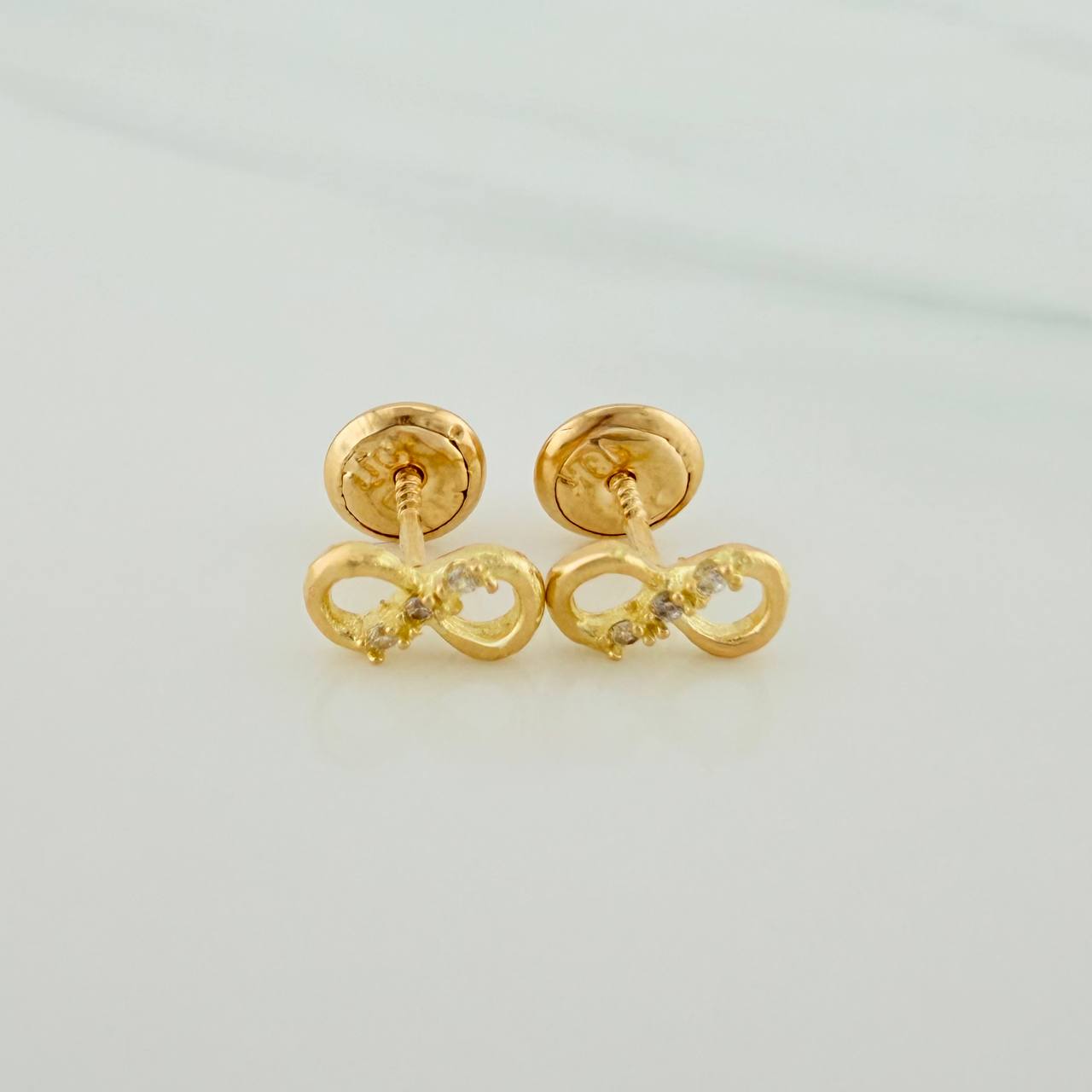Topos Infinito 0.7gr / Circones Blancos Oro Amarillo &