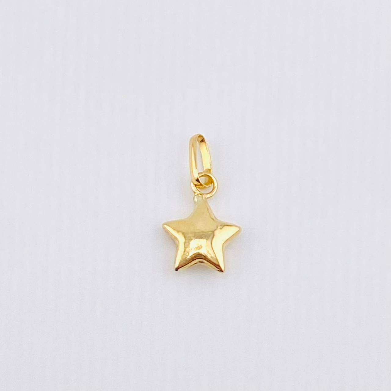 Dije Estrella 0.2gr / 1.3cm / Oro Amarillo 18K