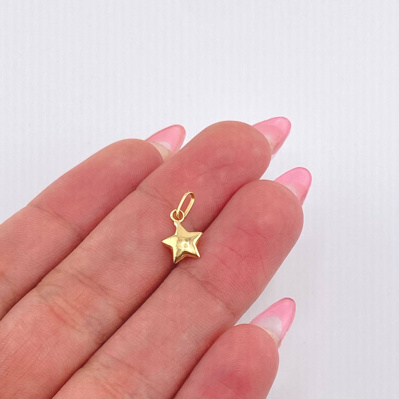 Dije Estrella 0.25gr / 1.4cm / Oro Amarillo 18K *