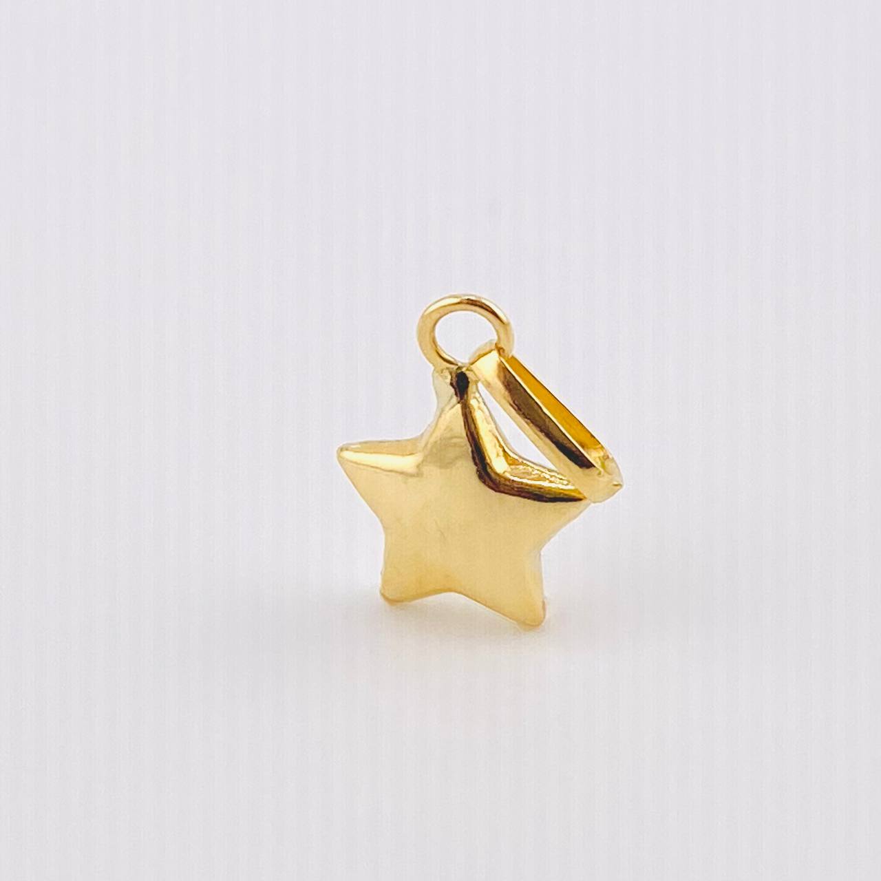 Dije Estrella 0.6gr / 2.8cm / Oro Amarillo 18K ©