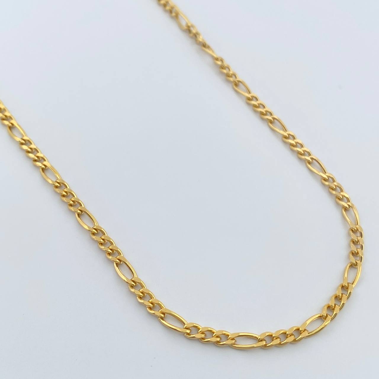 Cadena Figaro 6.5gr / 60cm / 2.93mm Oro Amarillo +1 18K $