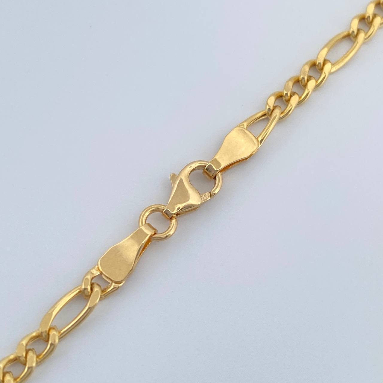 Cadena Figaro 6.5gr / 60cm / 2.93mm Oro Amarillo +1 18K $