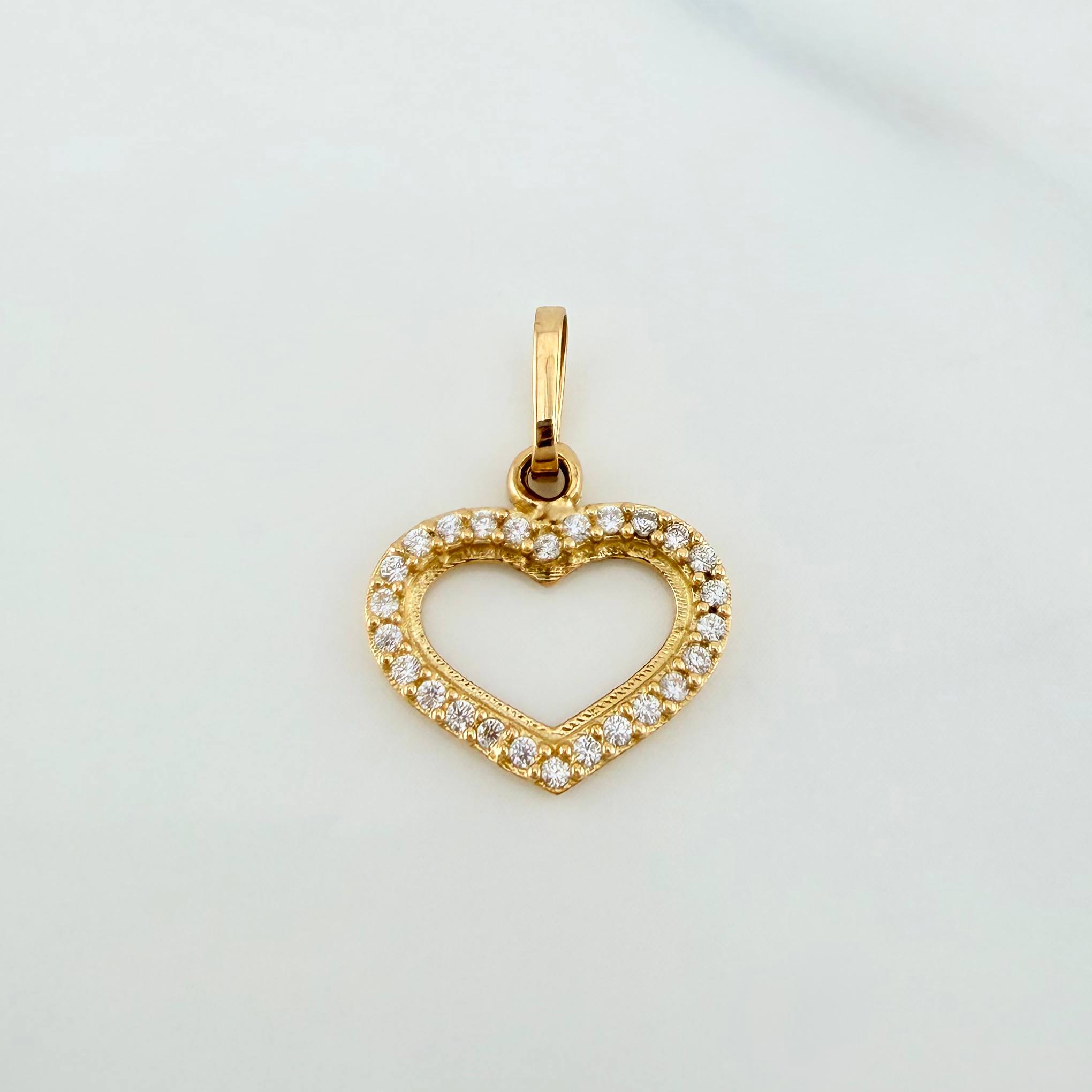 Dije Silueta Corazón 0.8 g / 1.7 cm Oro Amarillo 18K