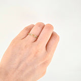 Anillo Carril Centro Corazón Esmeraldas 12pts 1.5g / T6 Oro Amarillo 18K