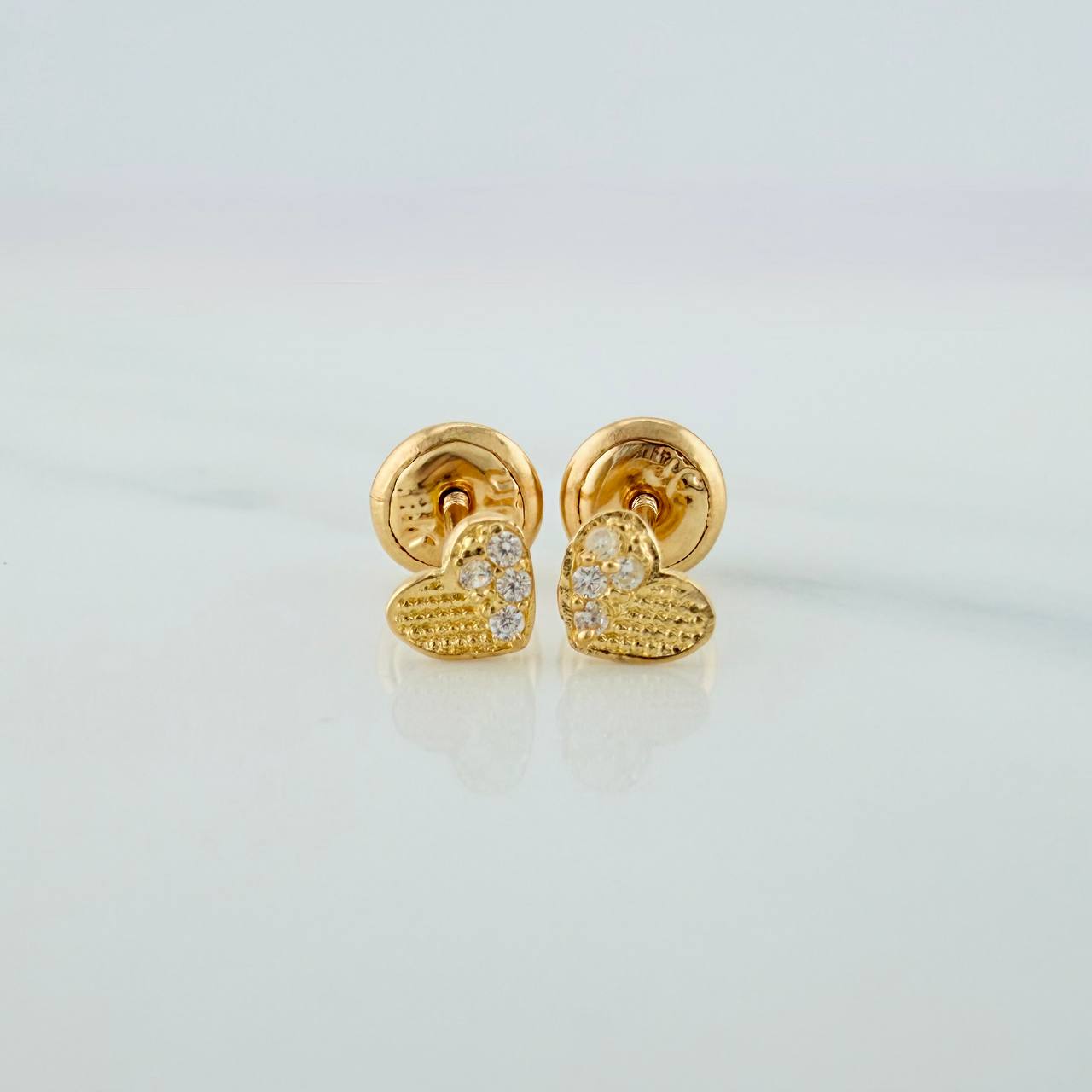 Topos Corazón Medio Destello 0.65gr / 4.49mm Oro Amarillo 18K
