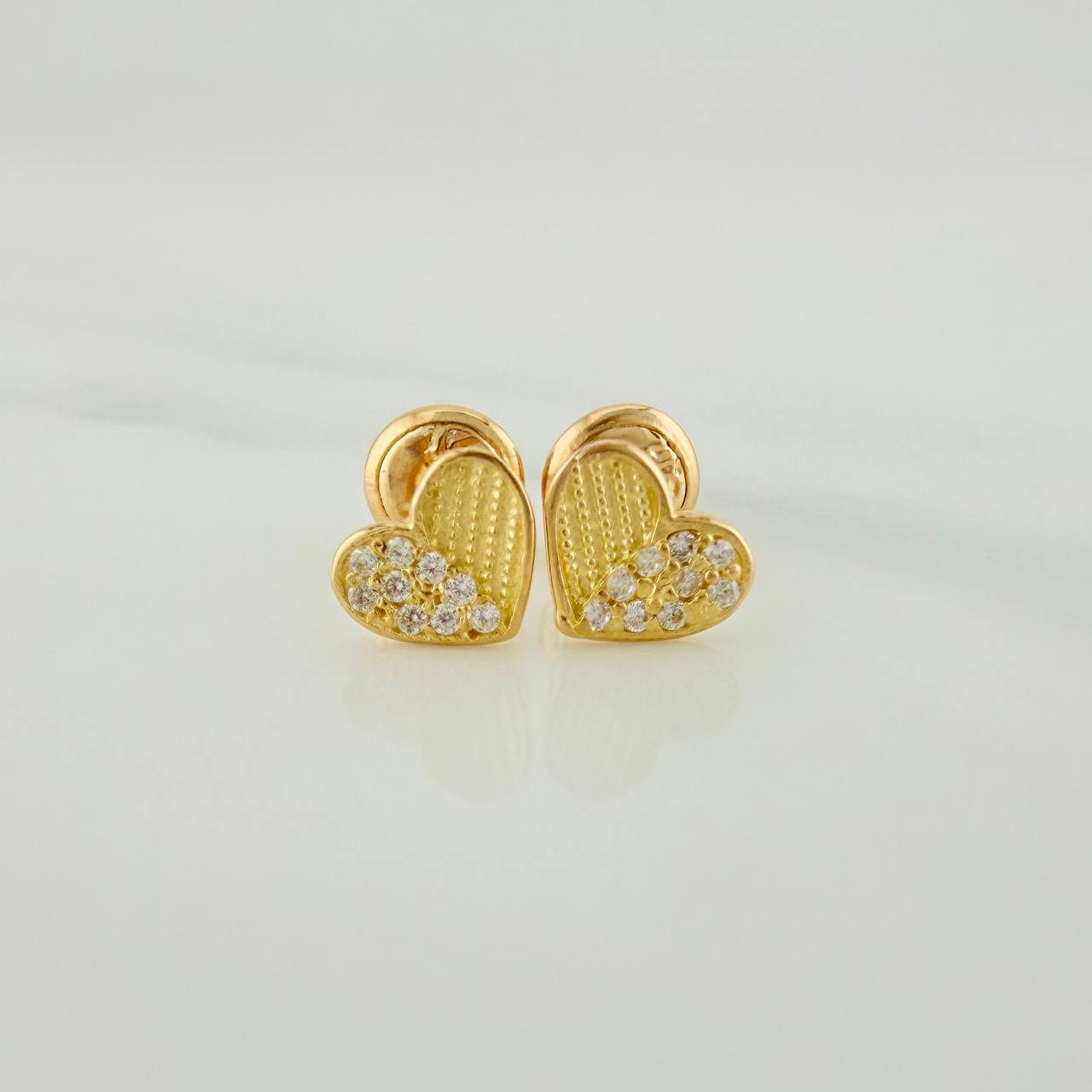 Topos Corazón Medio Destello 0.9gr / 7mm Oro Amarillo 18K