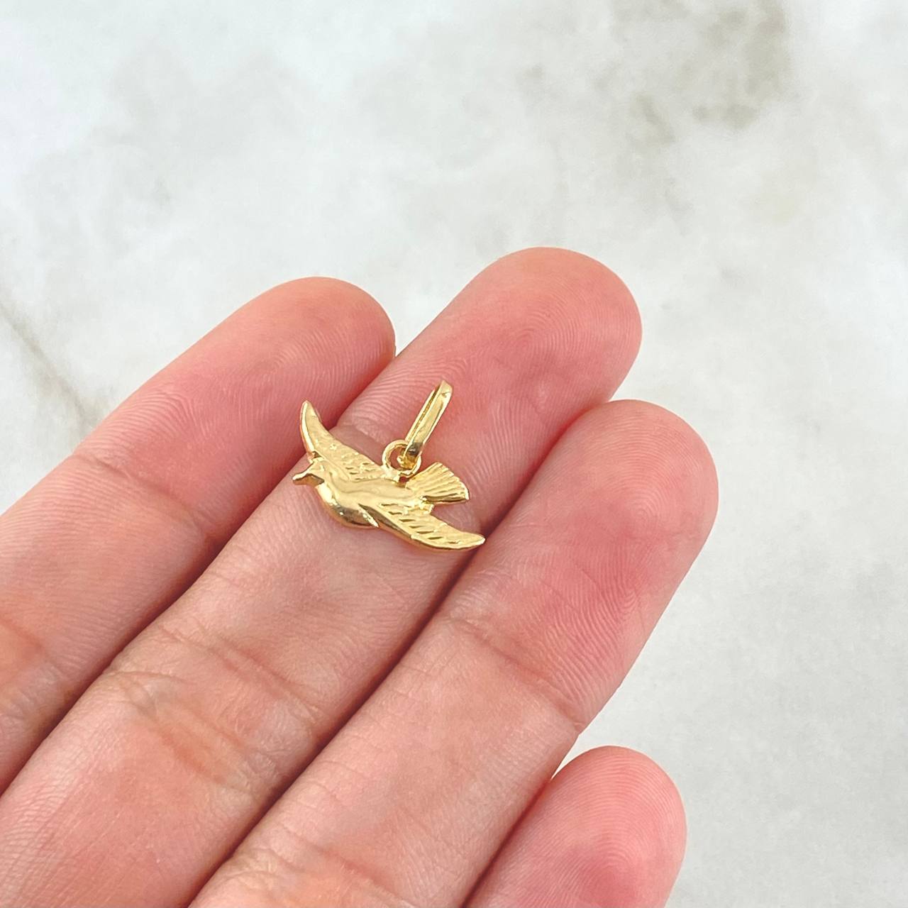 Dije Paloma 0.55gr / 1.3cm / Oro Amarillo 18K *