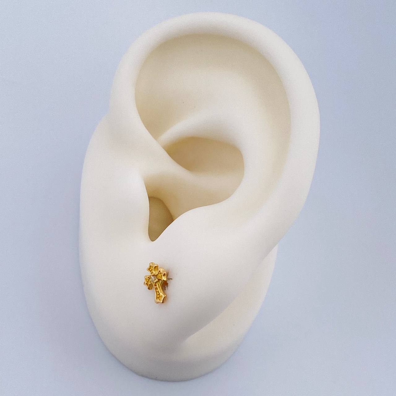 Topos Cruz 0.7gr / 0.6cm / Oro Amarillo 18K %