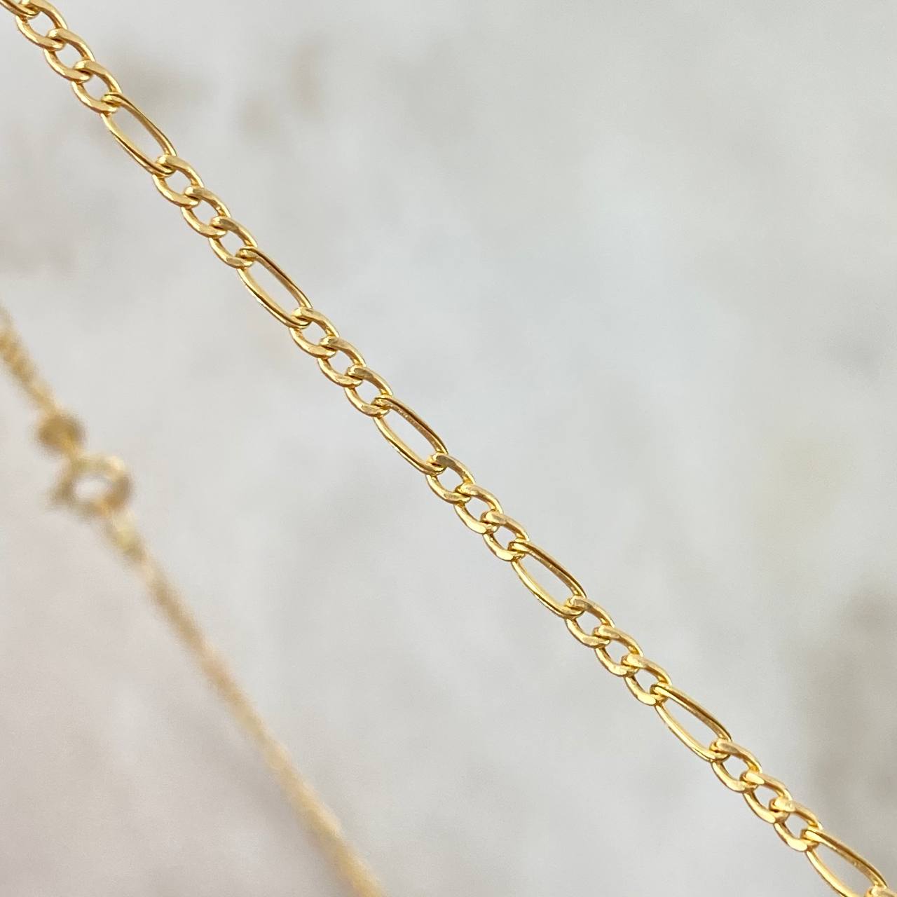 Cadena Figaro 1.2gr / 50cm / 2mm Oro Amarillo +1