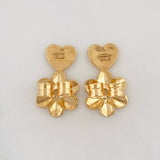 Topos Flor Esmeraldas 90pts Diamantes 0.04pts 2.85g / 7.46mm Oro Amarillo 18K