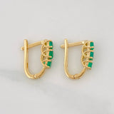 Candongas Omega Trio Esmeraldas 0.77pts 2.45g / 1.05cm Oro Amarillo 18K