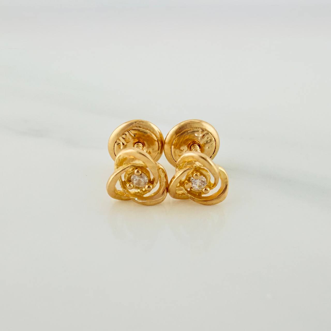 Topos Flor Espiral 0.75gr / 3.46mm Oro Amarillo 18K &