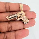Dije Pistola 10.95gr / 4cm / Dos Oros Negro Amarillo 18K $