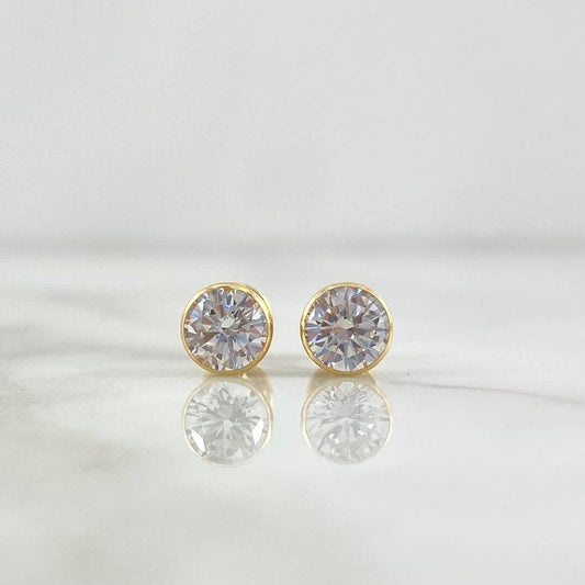 Topos Bisel 1.15gr / 6mm Circon Blanco Oro Amarillo 18K