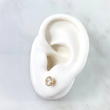 Topos Bisel 1.15gr / 6mm Circon Blanco Oro Amarillo 18K *