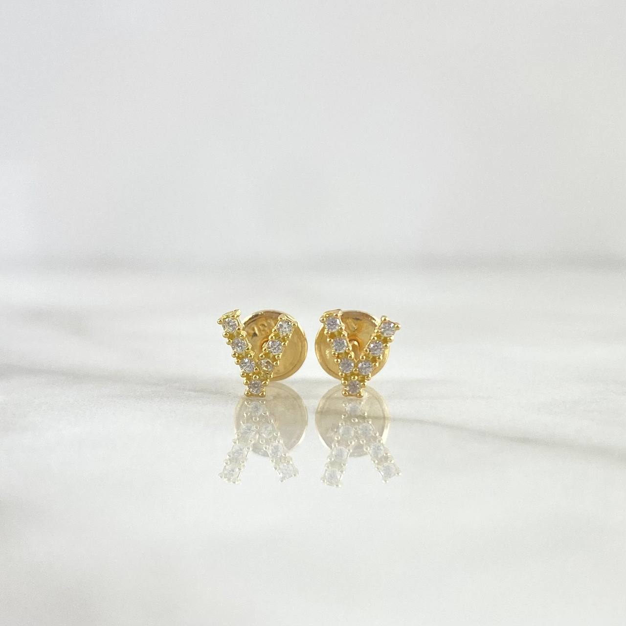Topos Letra V 0.65gr / 6mm Circones Blancos Oro Amarillo