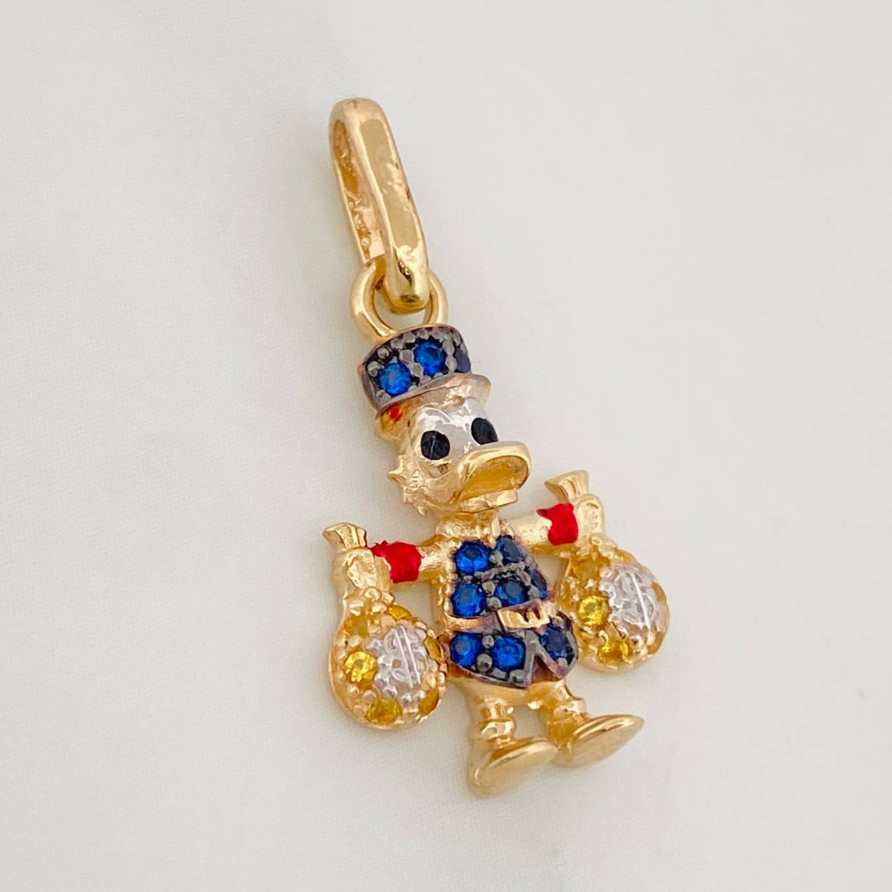 Dije Pato Bolsas de Dinero 1.6g / 2.1cm Tres Oros 18K