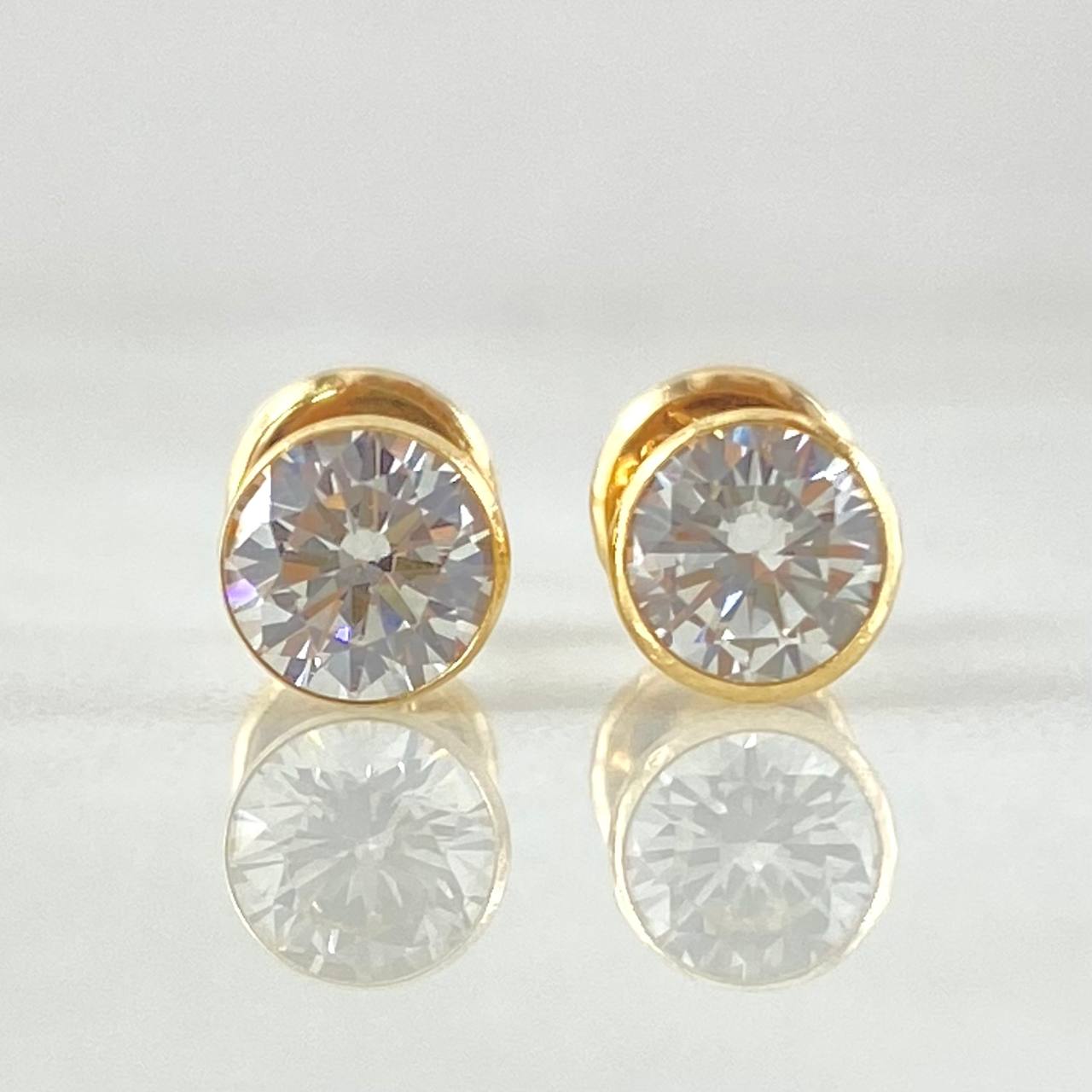 Topos Bisel 0.8gr / Oro Amarillo 18K ©