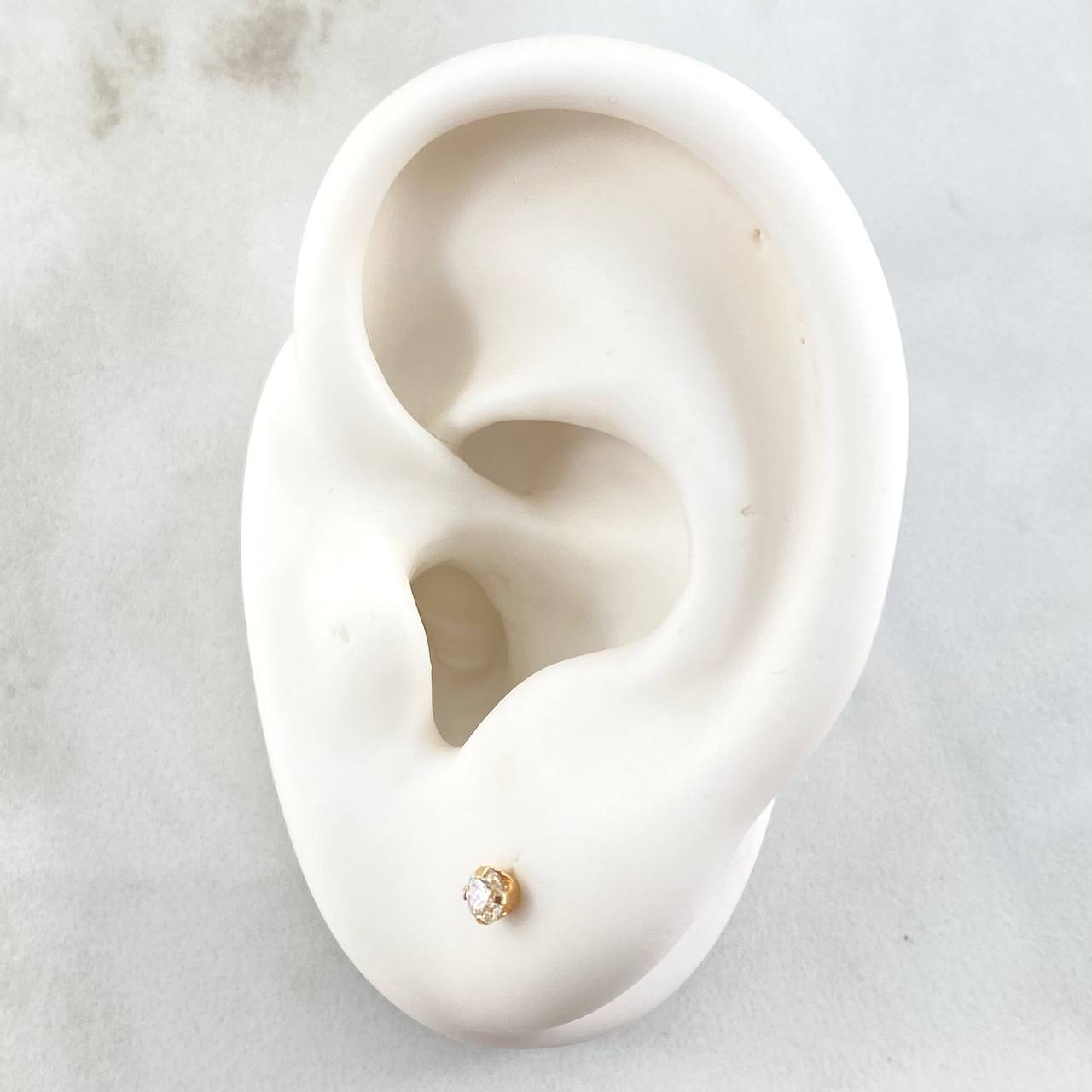 Topos Bisel 0.45gr / Oro Amarillo 18K