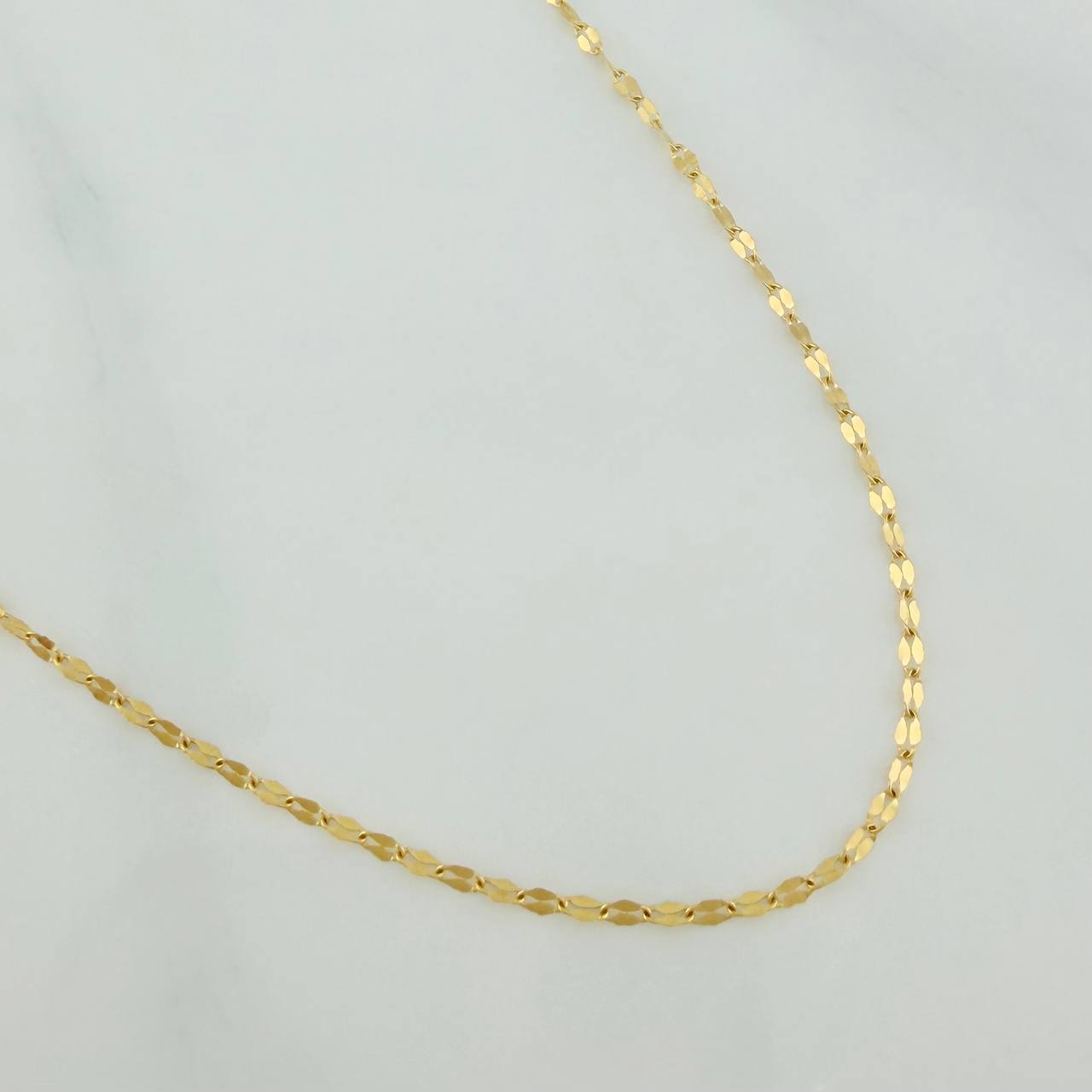 Cadena Flor Espejo 1.15gr / 60.3cm / 0.9mm Oro Amarillo +3 18K %