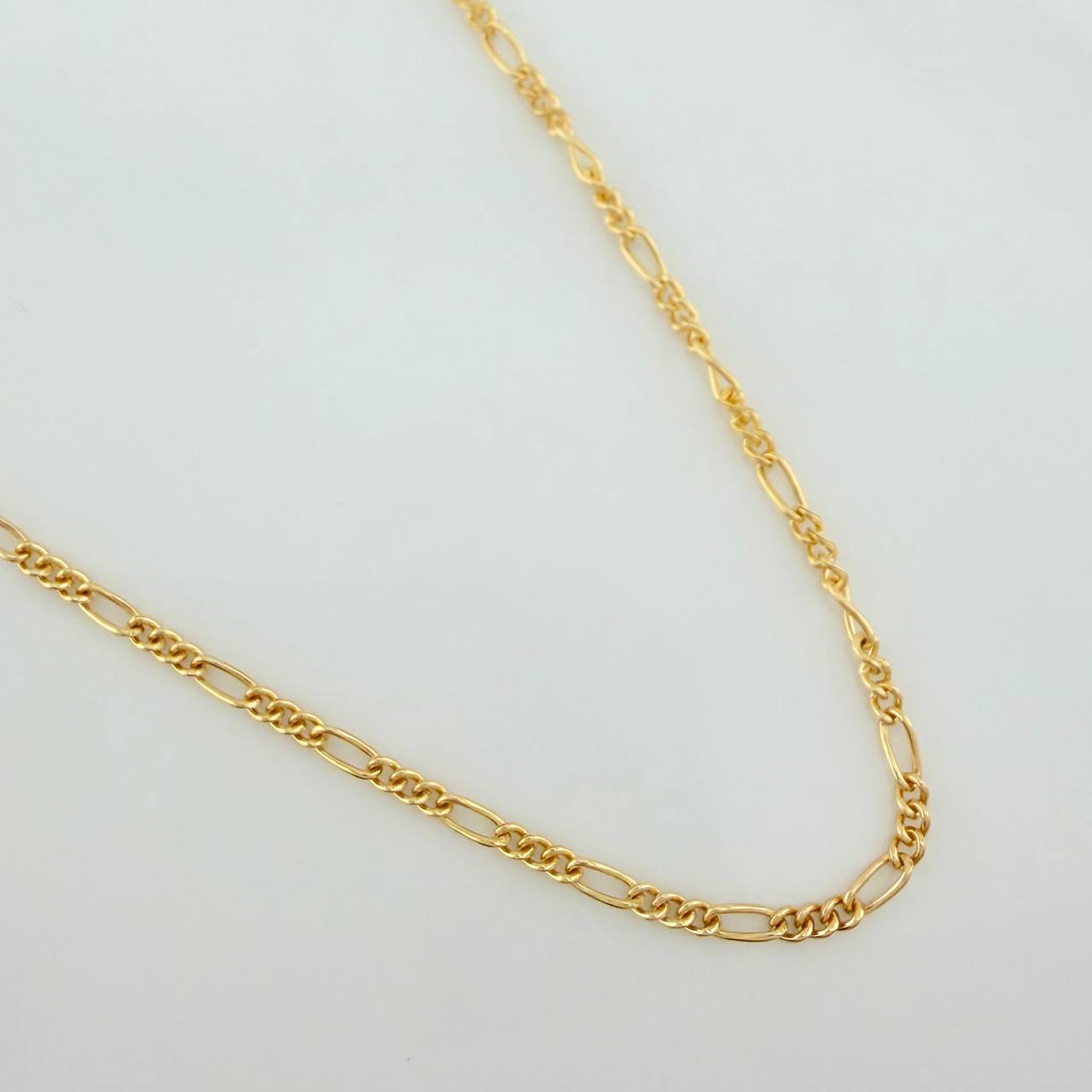 Cadena Figaro 1.8gr / 60.5cm / 1.2mm Oro Amarillo +1 18K %