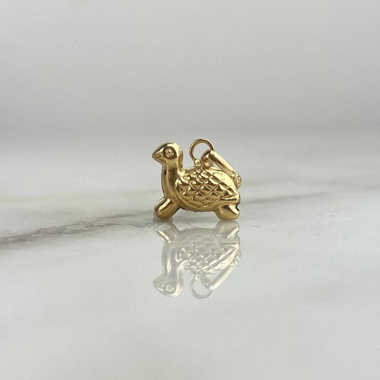 Dije Tortuga 0.55gr / 1.4cm Troquelado Oro Amarillo
