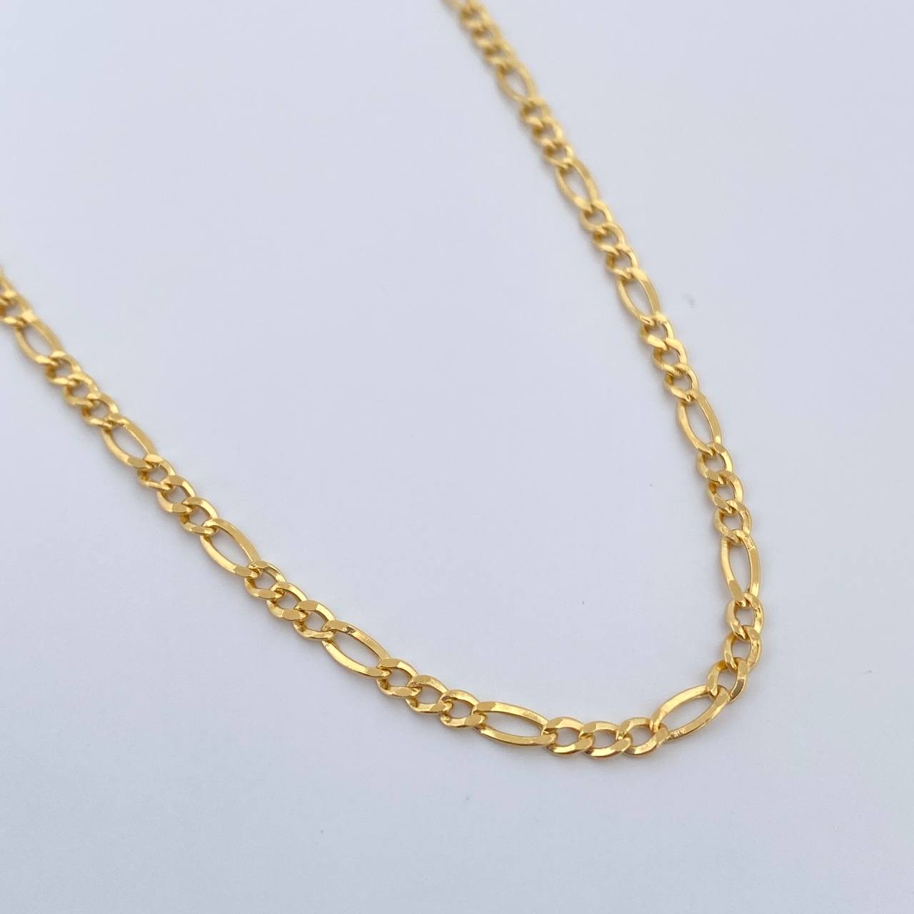 Cadena Figaro 3.15gr / 60cm / 2.1mm Oro Amarillo +1 18K %