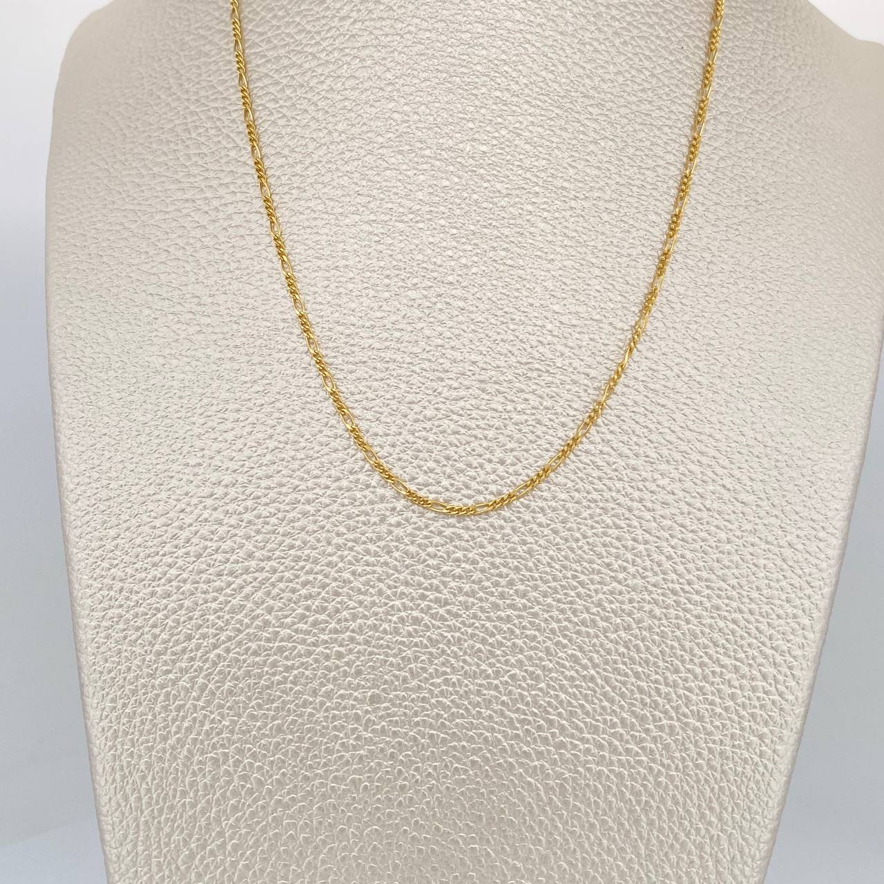 Cadena Figaro 1.5gr / 50.5cm / 1.4mm Oro Amarillo +1 18K $