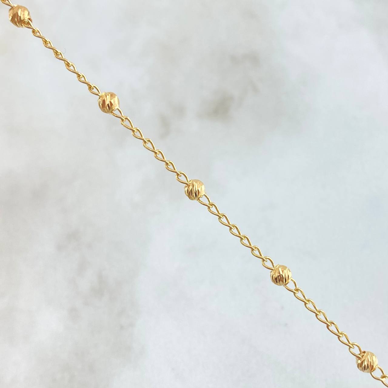 Tobillera Espiga Militar 2.35gr / 25cm / 3mm Bolas Diamantadas Oro Amarillo 18K