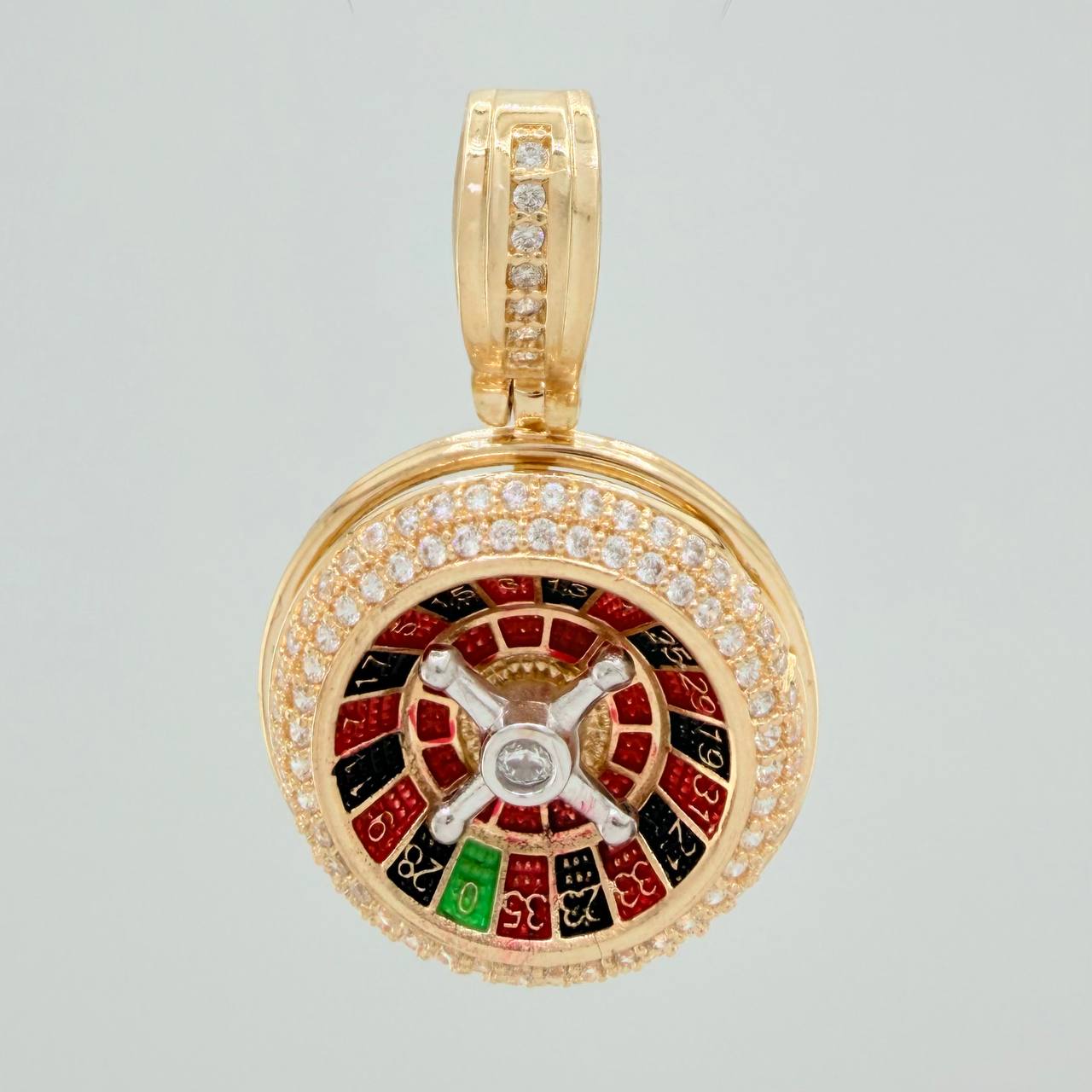 Dije Ruleta 6.6gr / 3cm / Dos Oros Amarillo Blanco 18K %