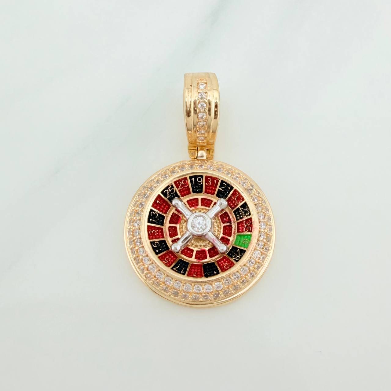 Dije Ruleta 6.6gr / 3cm / Dos Oros Amarillo Blanco 18K %