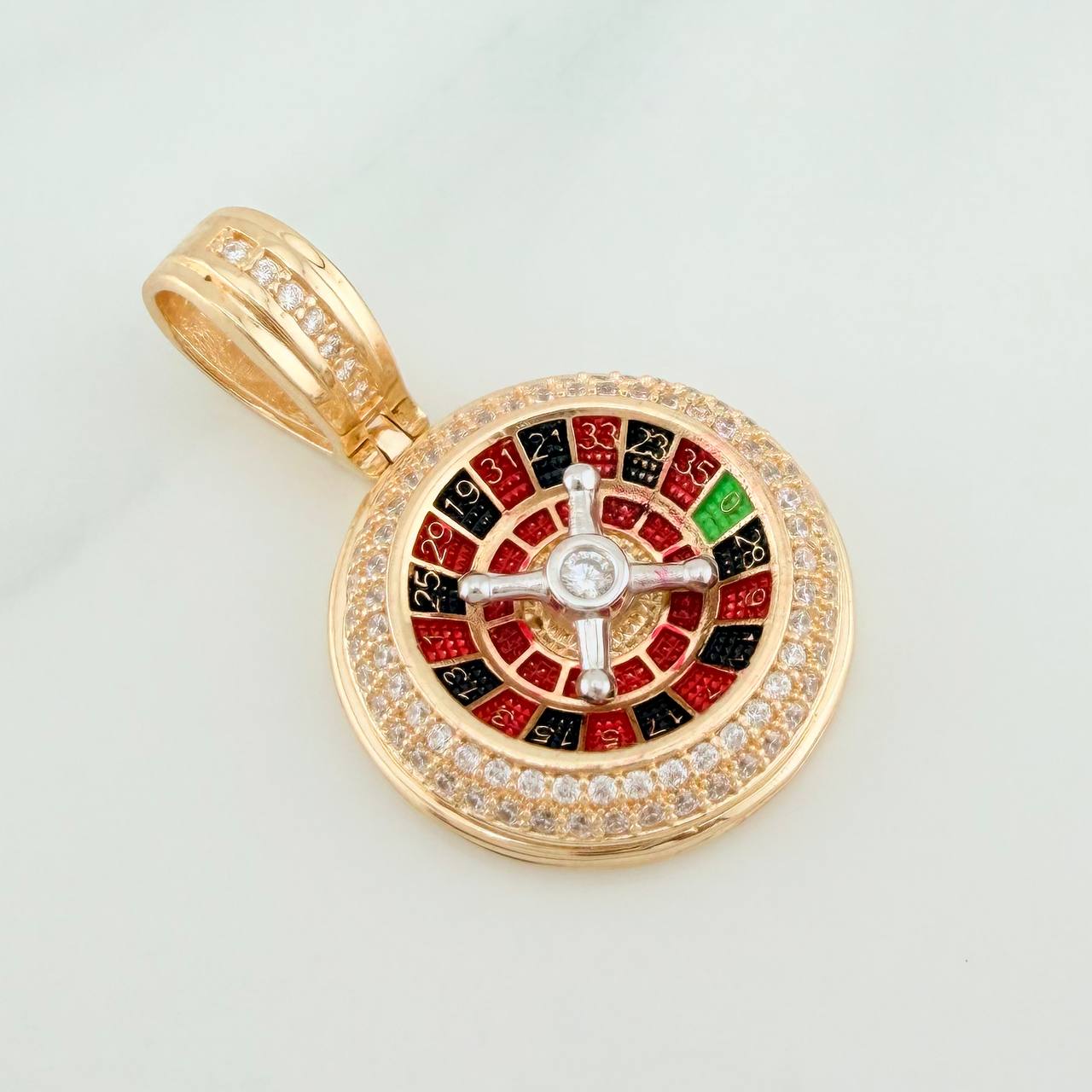 Dije Ruleta 6.6gr / 3cm / Dos Oros Amarillo Blanco 18K %