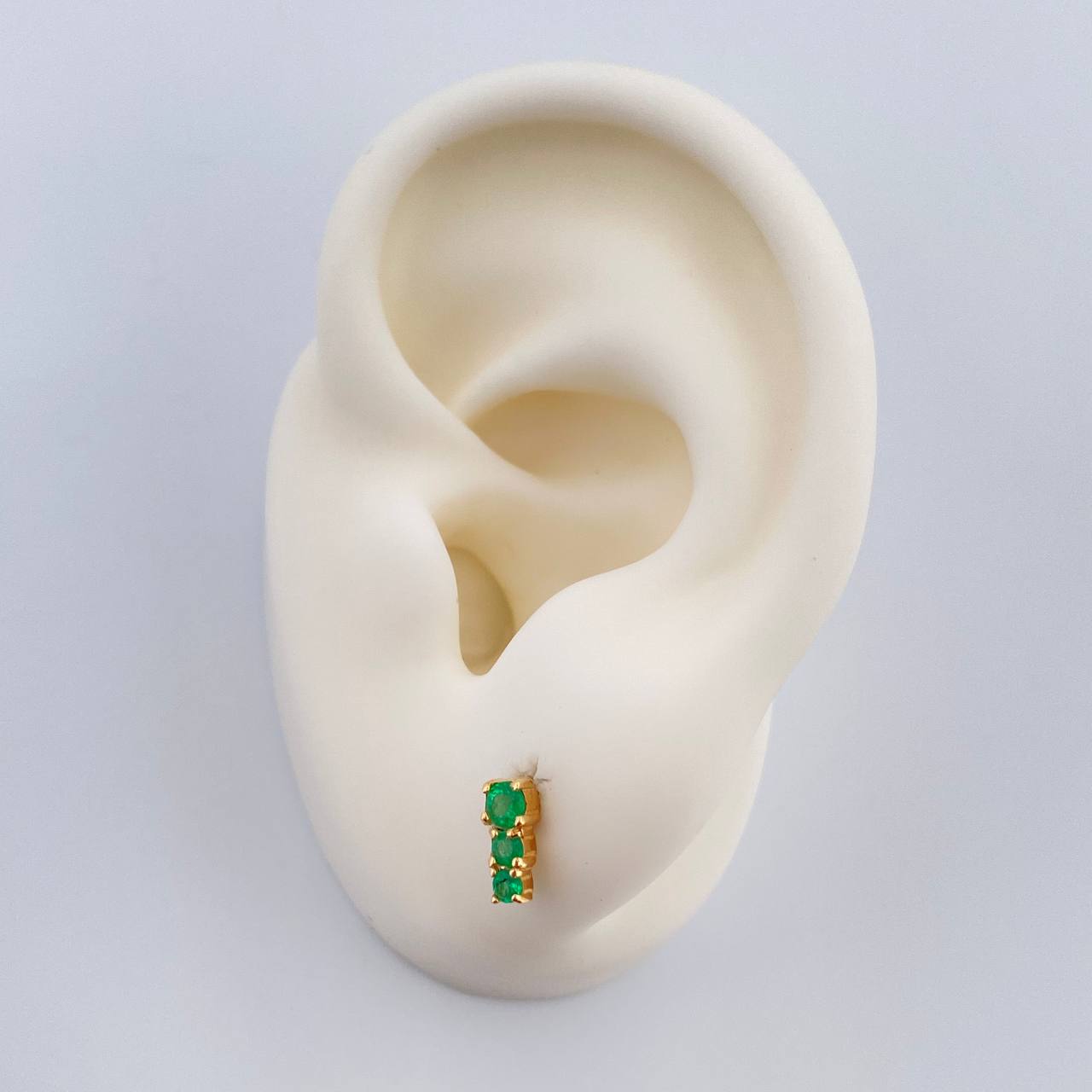 Topos Trio Esmeraldas 1.2gr / 7.4mm Oro Amarillo 18K $